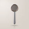 SUHAE Radiance vitamin C shower head in chrome, front view of the spray plate